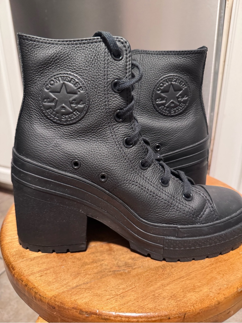 Black leather Converse heeled shoes, size 8.5